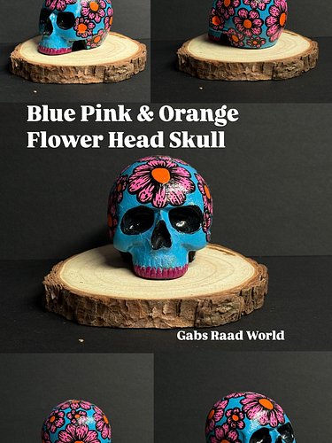 Blue💙Pink💖& Orange🧡 Flower Head Skull 

The way the pink pops on the blue🤯, I have to create more like this. Check out my pag...