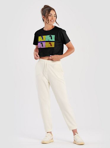 Featuring a vibrant pop art composition, this crop top offers a relaxed fit and exceptional softness, crafted from 100% combe...