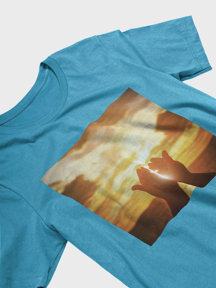 Cupped hands holding a glowing cross silhouette t-shirt product image (2)