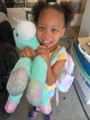 Sporting the double puffs and unicorns today. 💙✨️🫶🏾✨️💙