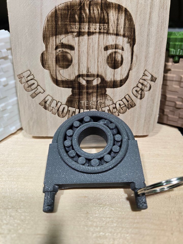 The Muffler Bearing Fidget Spinner Keychain! product image (1)