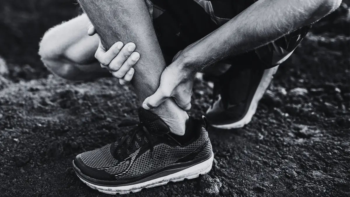 sharp heel pain from Achilles Tendinitis, a common cause of heel pain and plantar fasciitis