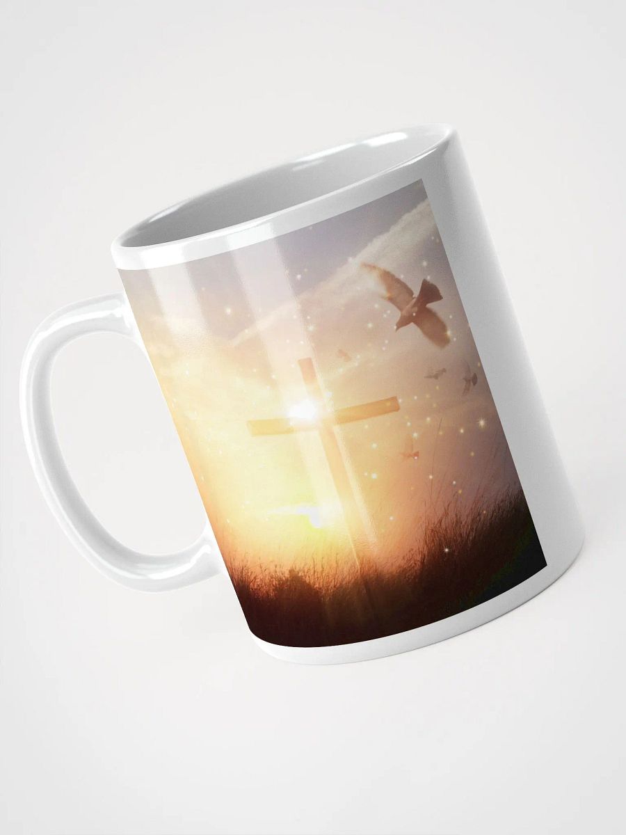 A cross standing against a serene landscape of rolling hills & a Radiant cross illuminated by a bright, golden light with glowing sunrise & doves Mug product image (6)