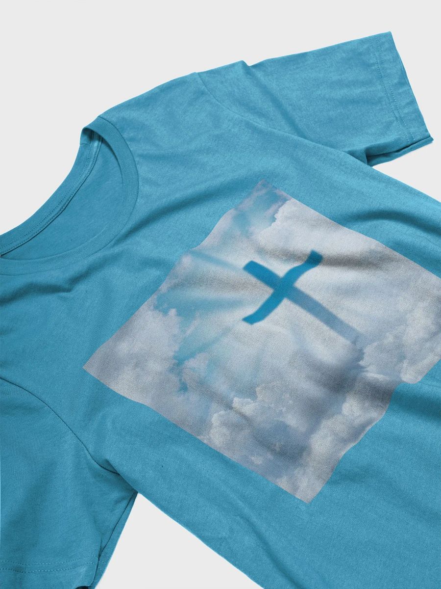A cross surrounded by a heavenly scene, with rays of light shining through soft clouds in a bright blue sky t-shirt product image (10)