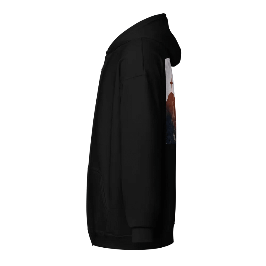 Wooden cross standing atop a rocky hill or mountain, under a sky filled with soft clouds and warm sunlight Hoodie product image (3)