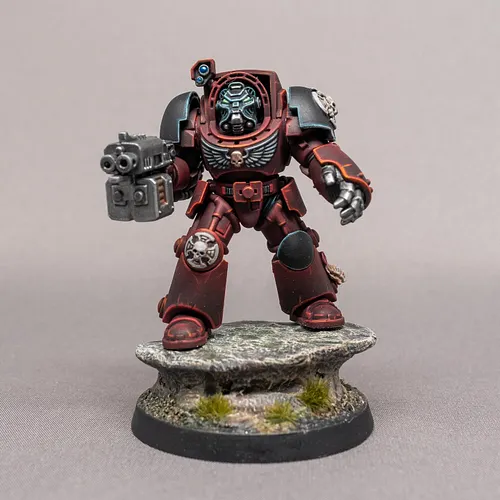 My first attempt trying to paint like the box art, a Flesh Tearer Terminator. Pretty happy with the result, but lots of room ...