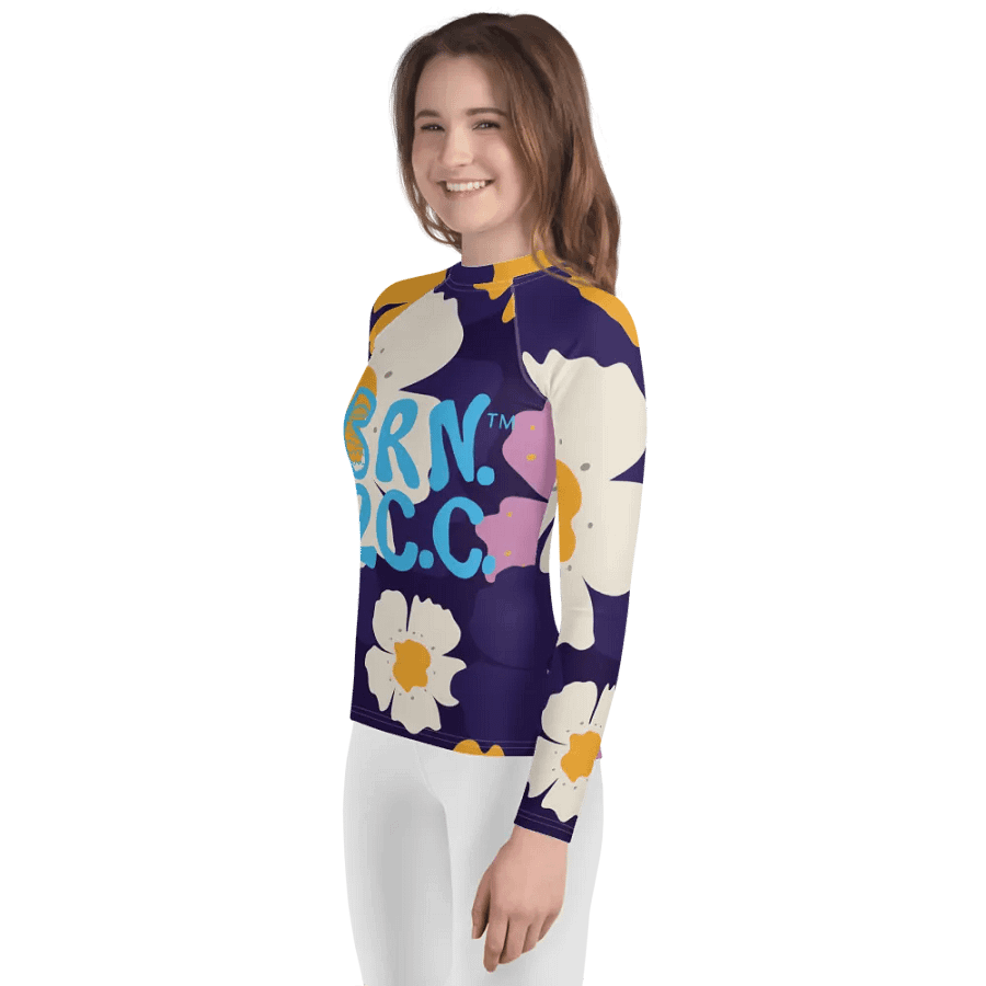 Girls' | YOUTH | Rash Guard | BRN.2C.C.™ Front Graphic | BOURNE to Cape Cod™ Sleeve & Back Logo | Coastal Swim Shirt for Kids | UV Protection Activewear | Blue Logo | Bold Purple Floral product image (3)