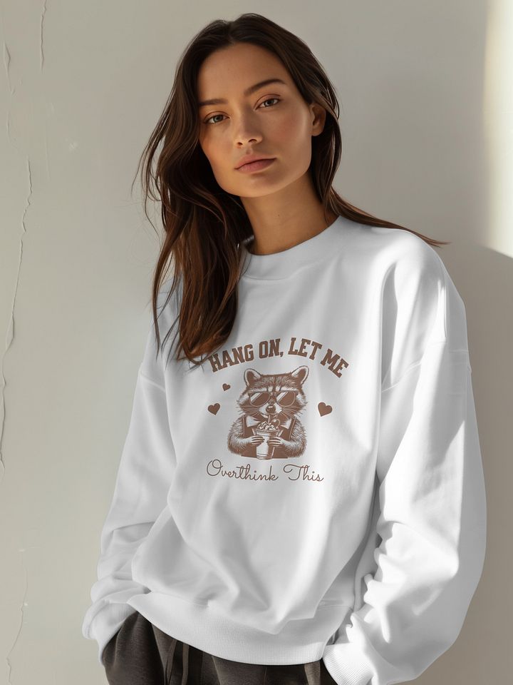 Funny Raccoon Sweatshirt – “Hang On, Let Me Overthink This” – Cozy Mental Health Awareness Pullover for Overthinkers & Introverts product image (1)