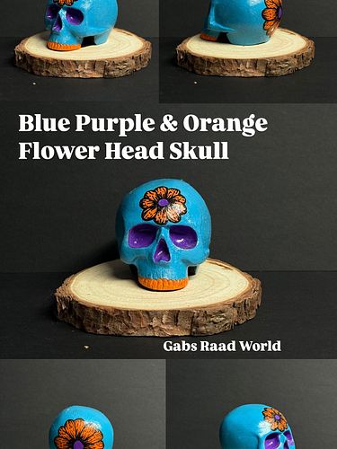 Blue Purple & Orange 🔵🟠🟣 Flower Head Skull💀

If there was a little green added to this, it would give me more ScoobyDoo vibes...