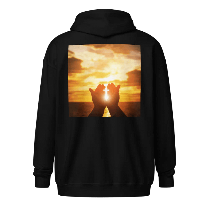 Cupped hands holding a glowing cross silhouette Hoodie product image (1)