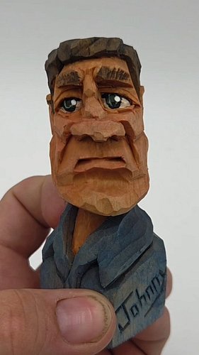 Behold: the pinnacle of cinematic excellence, a moody slow rotation of a 4-inch tall wood guy named absolutely nothing. Just ...