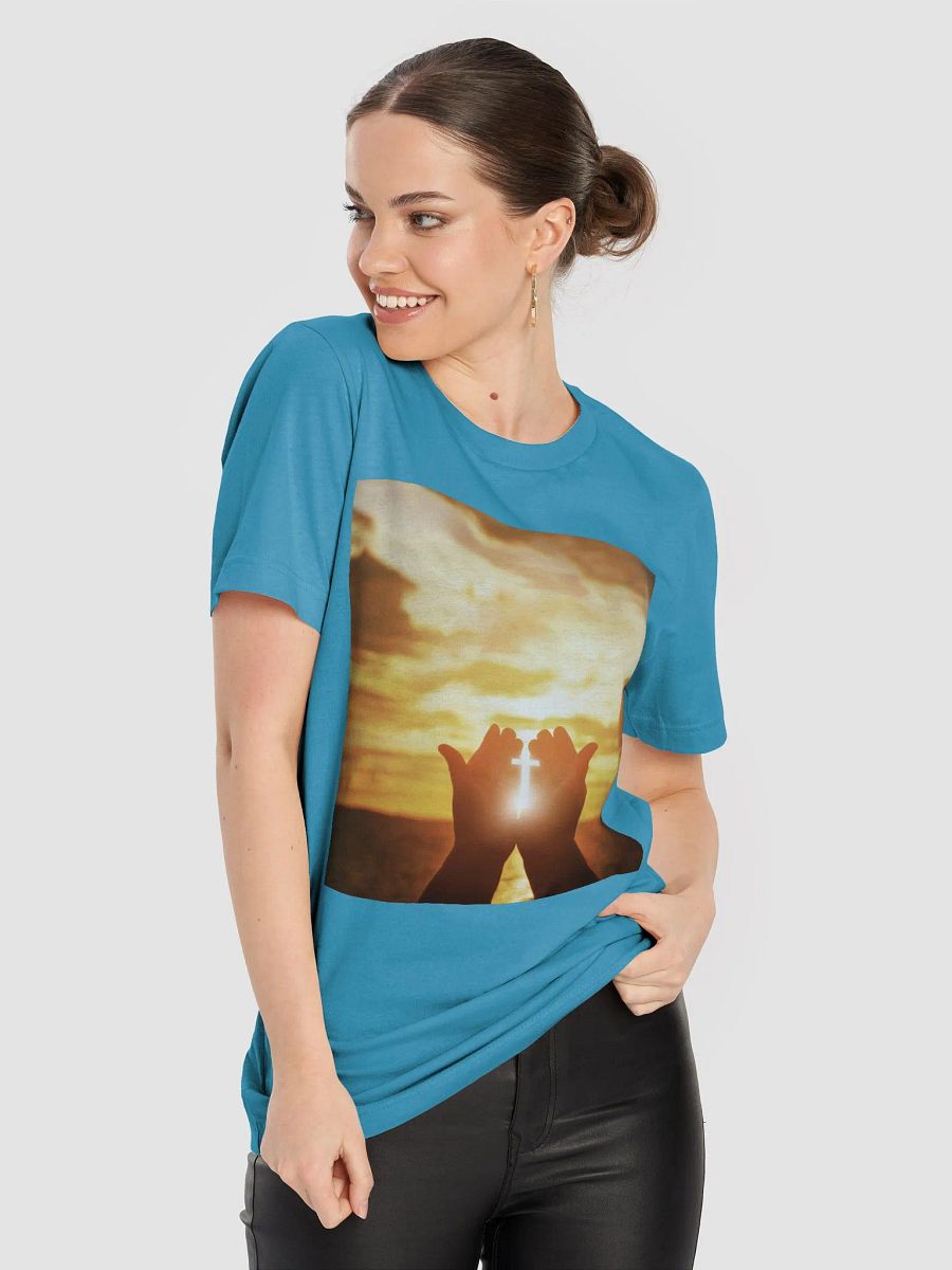 Cupped hands holding a glowing cross silhouette t-shirt product image (7)