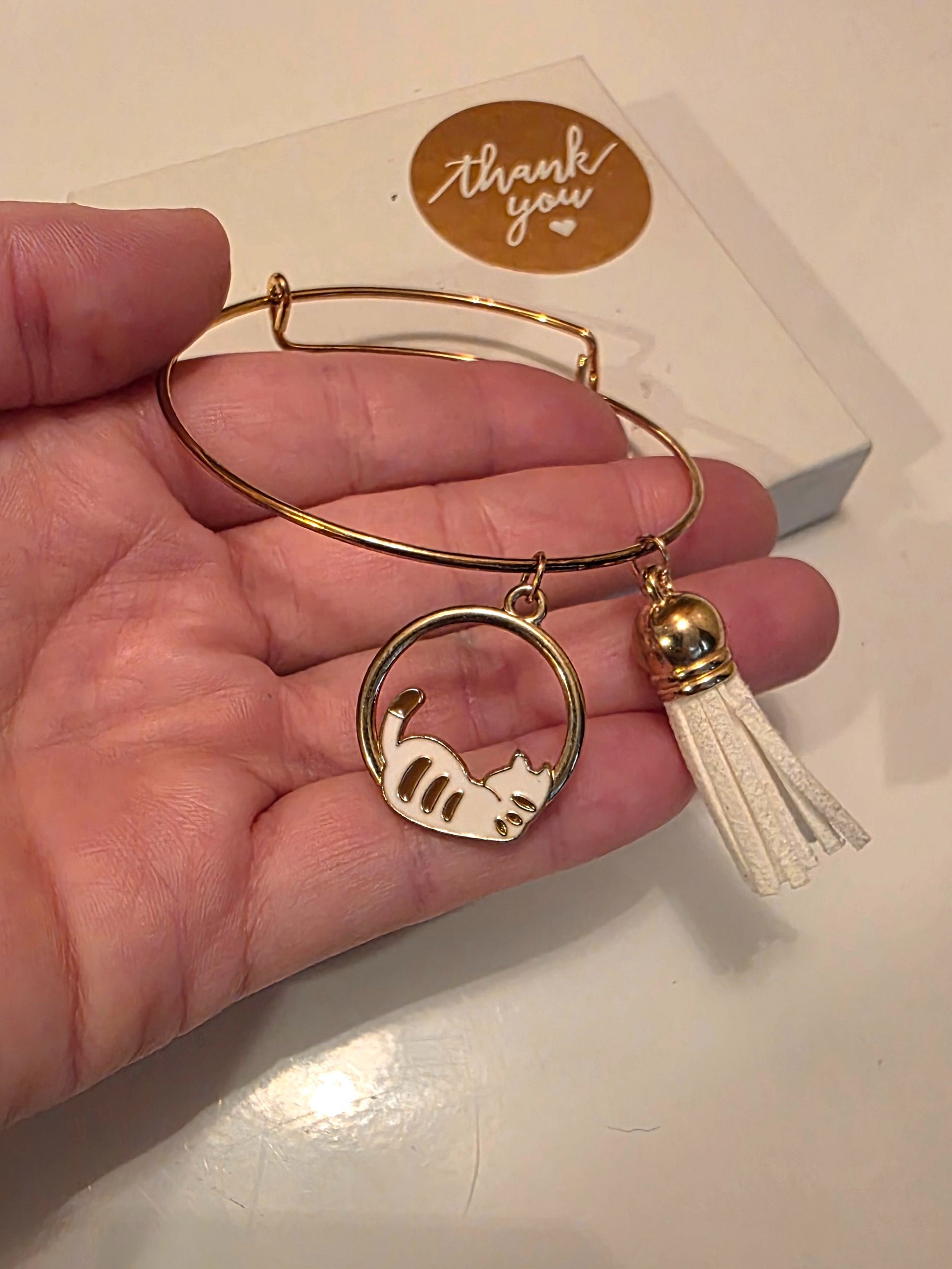 Lounging Cat Bangle Bracelet with Suede Tassel product image (1)