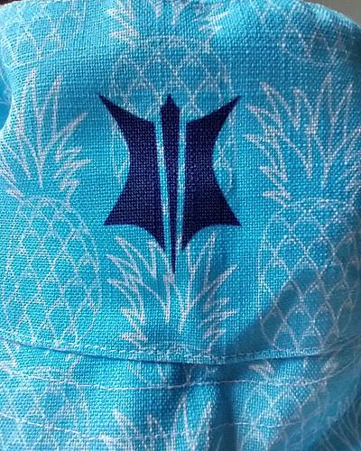 Bucket hats just arrived! This nice blue and white pineapple design is the inside of the Pinoot hat.
But wait, what's this ne...