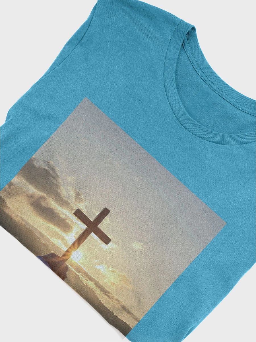 Wooden cross being held up against the backdrop of a sunrise t-shirt product image (4)