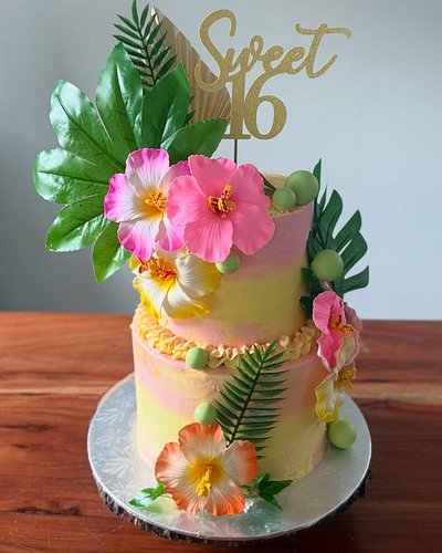 🌺 Aloha, Sweet 16! 🌴

This tropical beauty was made for a Luau-themed celebration — layers of fluffy vanilla cake filled with...