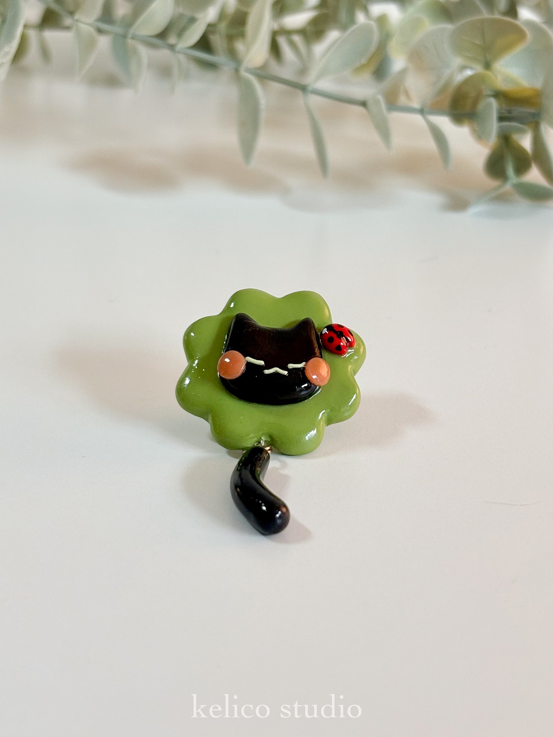 lucky clover cat • clay pin product image (1)