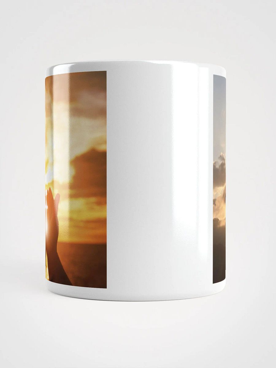Cupped hands holding a glowing cross silhouette & Wooden cross being held up against the backdrop of a sunrise Mug product image (5)