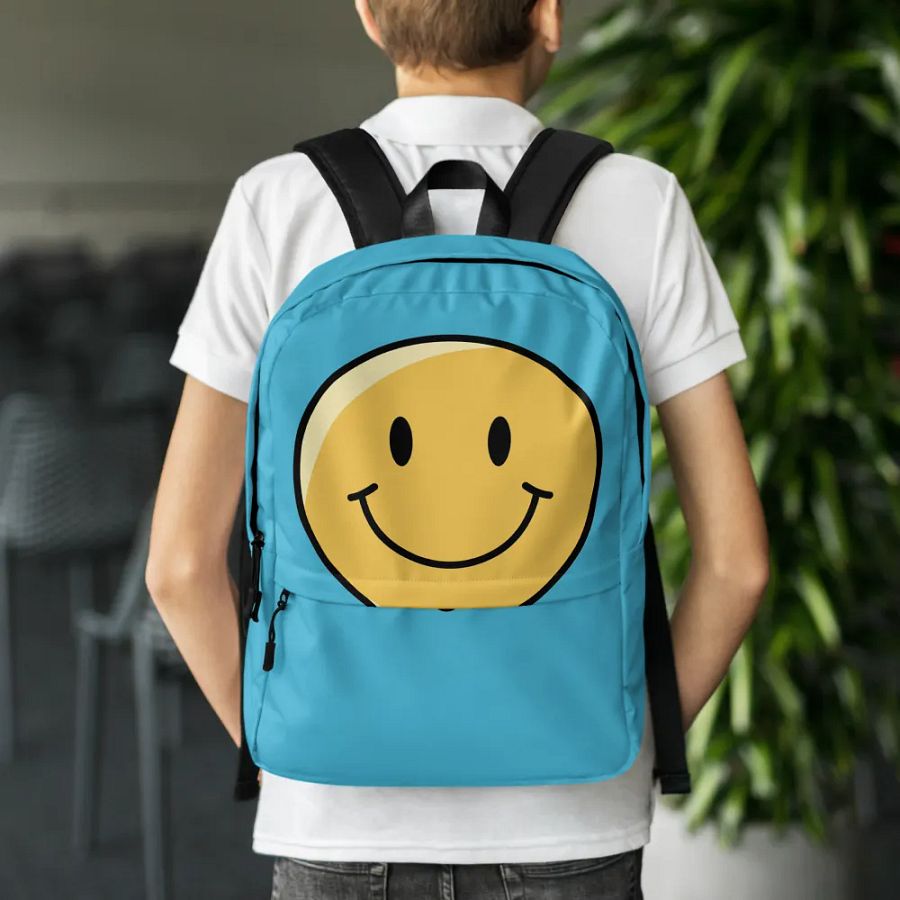 Blue backpack with a happy face product image (7)