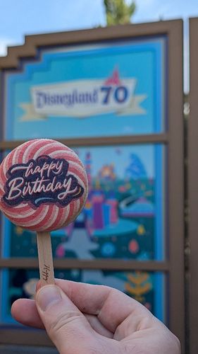 Trying the new Celebration Macaron from Kayla's Cake in Downtown Disney! This is a jumbo macaron on a stick with strawberry c...