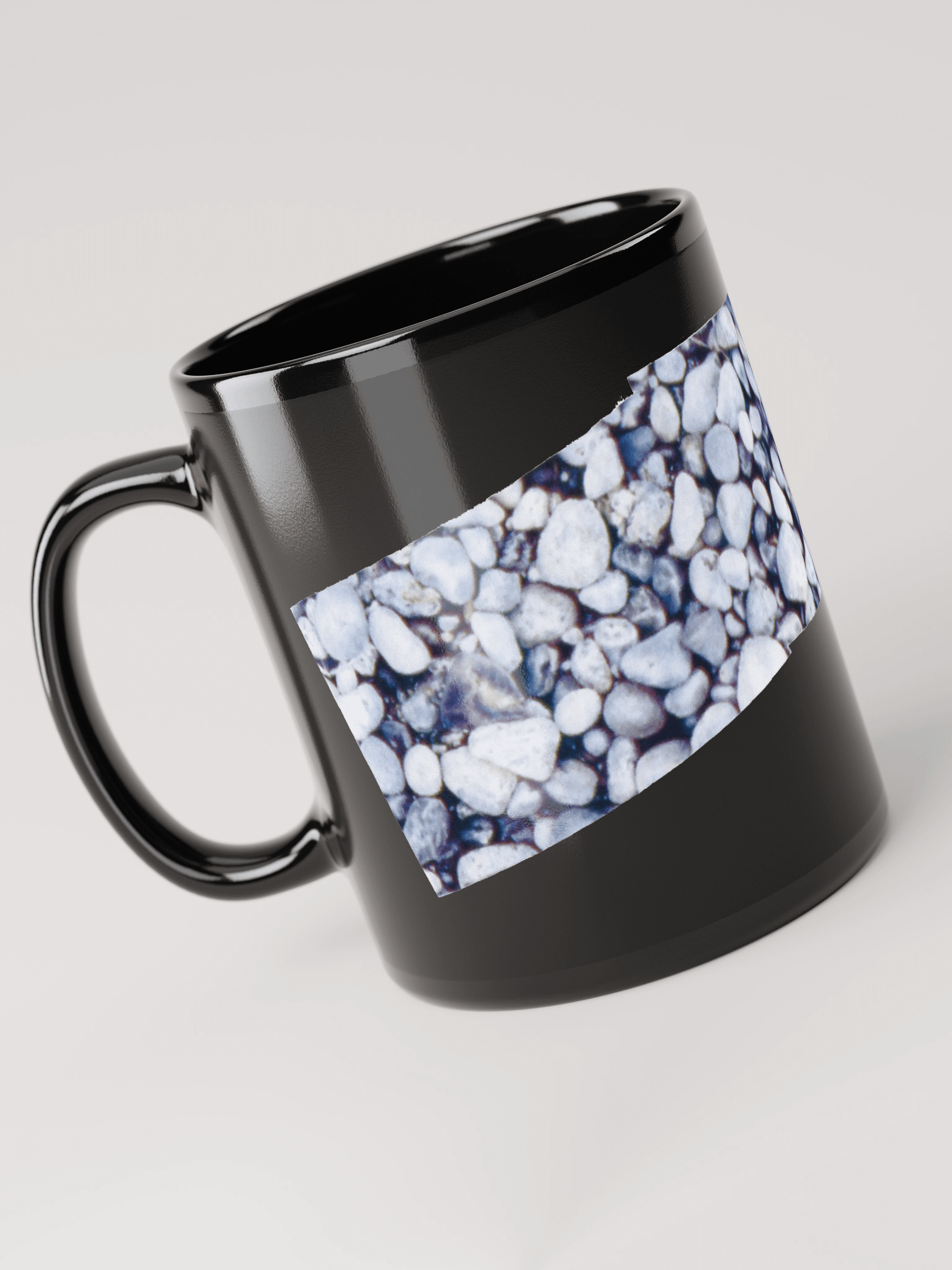 Cama Beach Rocks on black glossy mug product image (3)