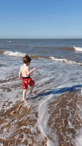 First time in the sea at the beach x