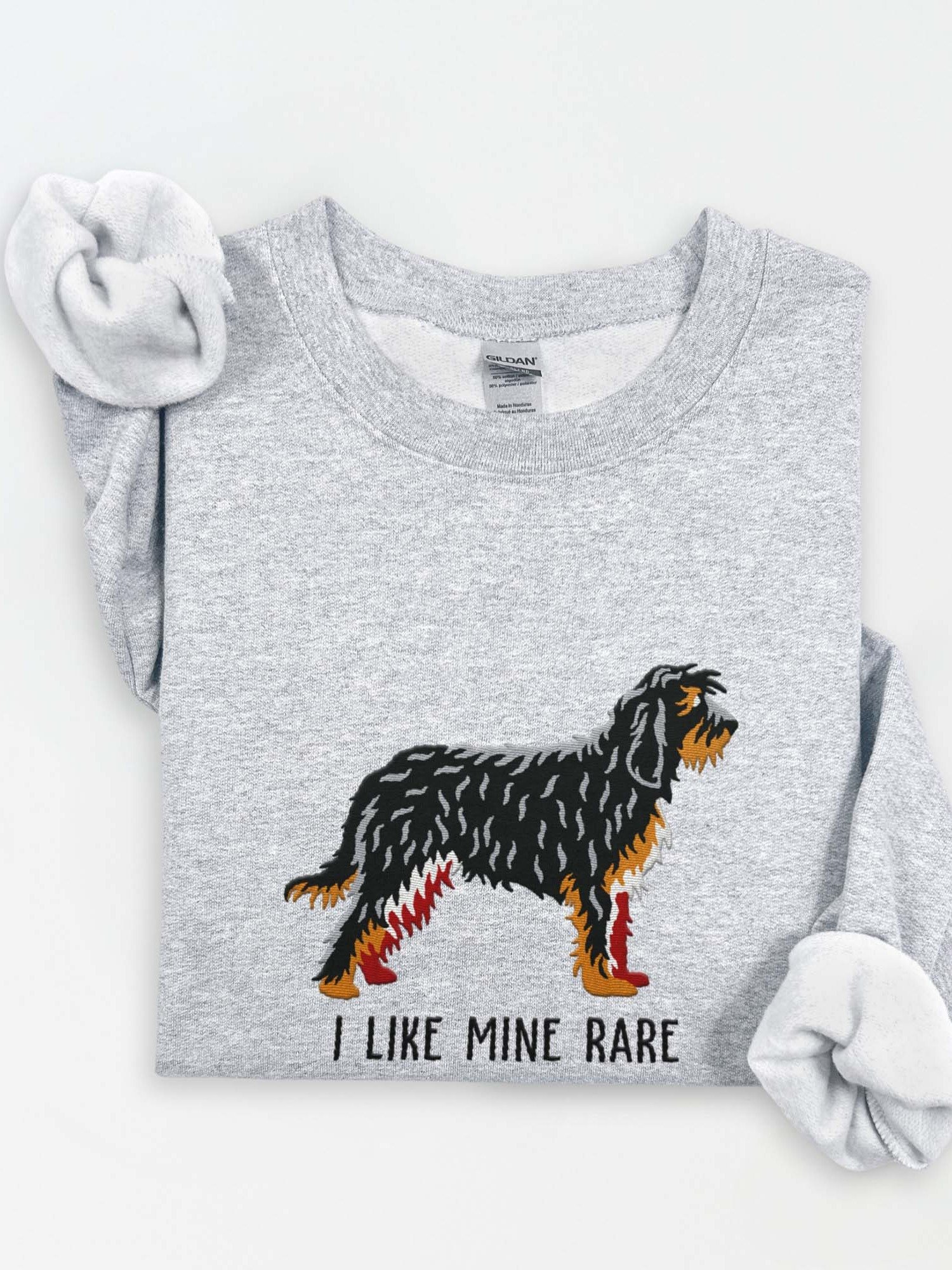 I Like Mine Rare Sweatshirt (Embroidered) of an Otterhound(Black & Tan) product image (1)