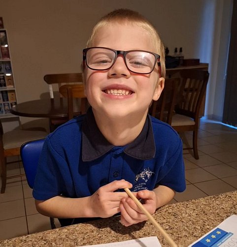 Glasses or no, my lil lad looks awesome!