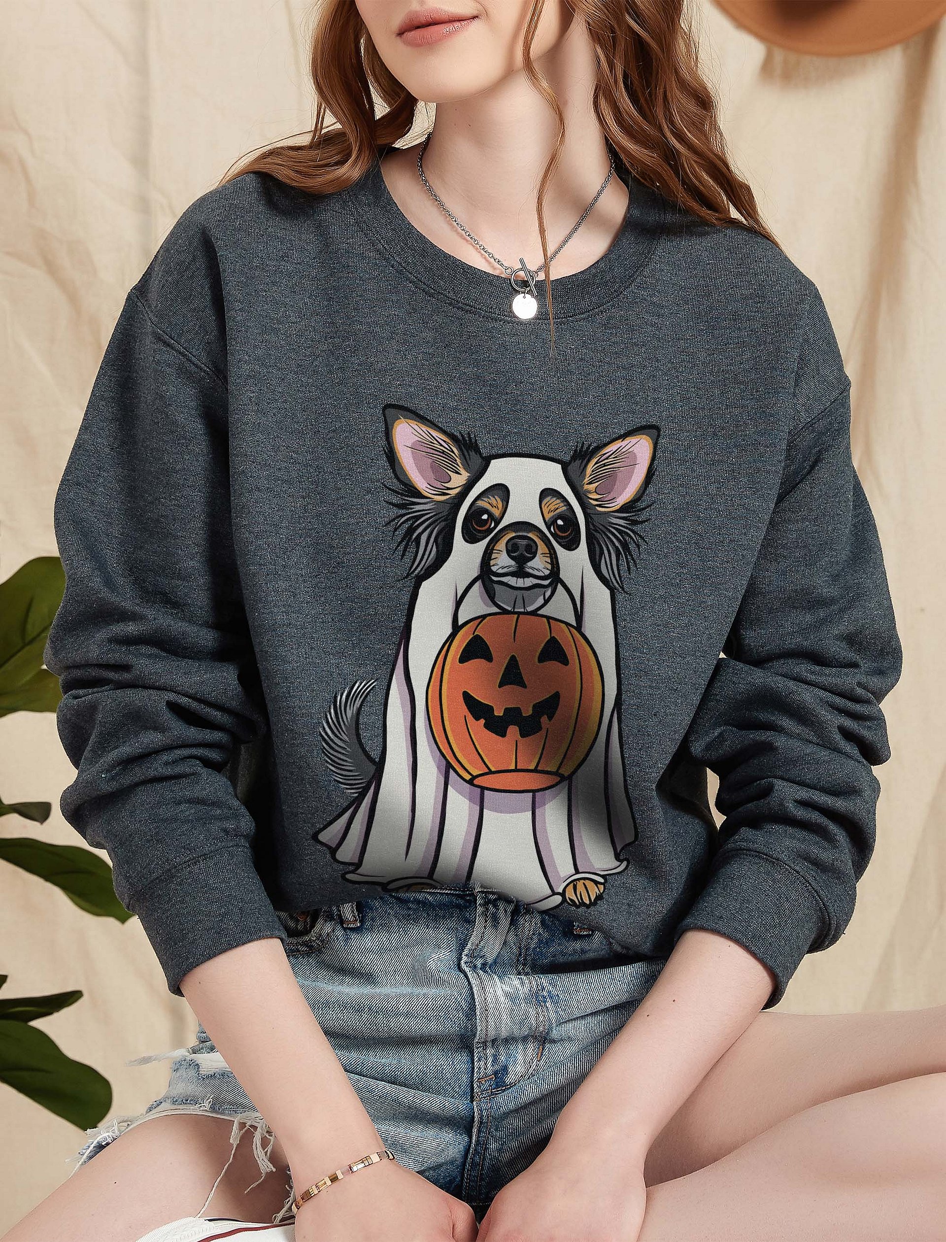Funny Halloween Longhaired Chihuahua(Tricolor) Sweatshirt | Funny Chihuahua Wearing a Ghost Costume and Holding a Pumpkin Basket product image (1)