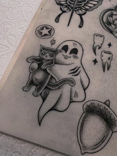 Tattoo practice 
👻✨ A spooky little ghost with battle scars,
 holding the grumpiest Halloween cat 🐾🎃

#tattoo #tattoo practic...