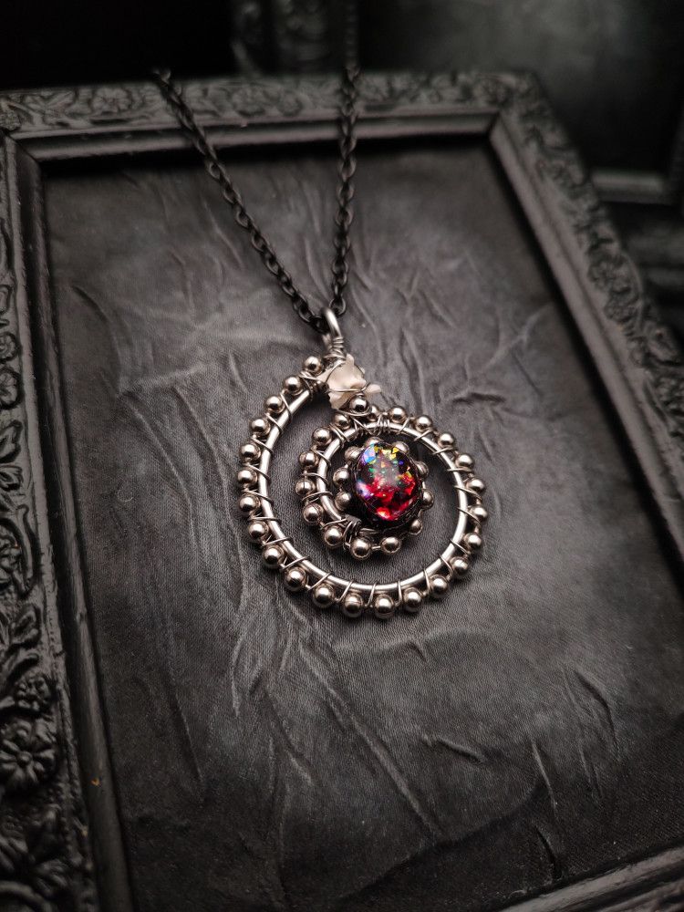 Wrapped Talisman - Blood Galaxy Coil I product image (1)