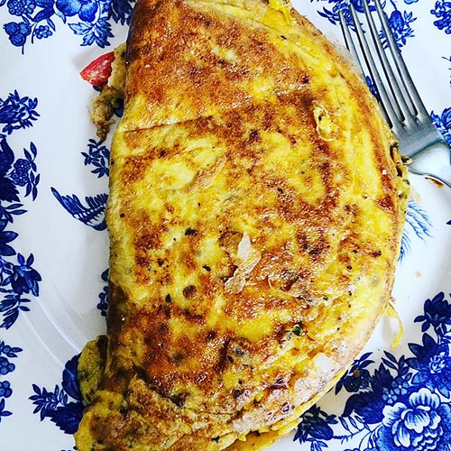 Omelet made with tomato from my garden.