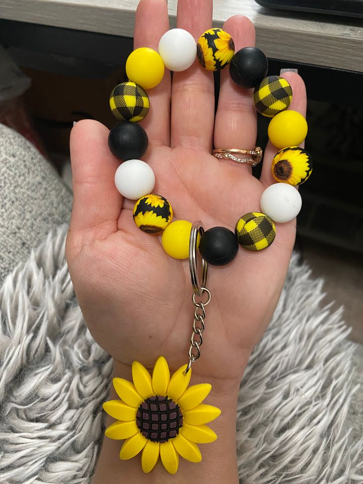 Where the Flowers Bloom keychain wristlet product image (1)
