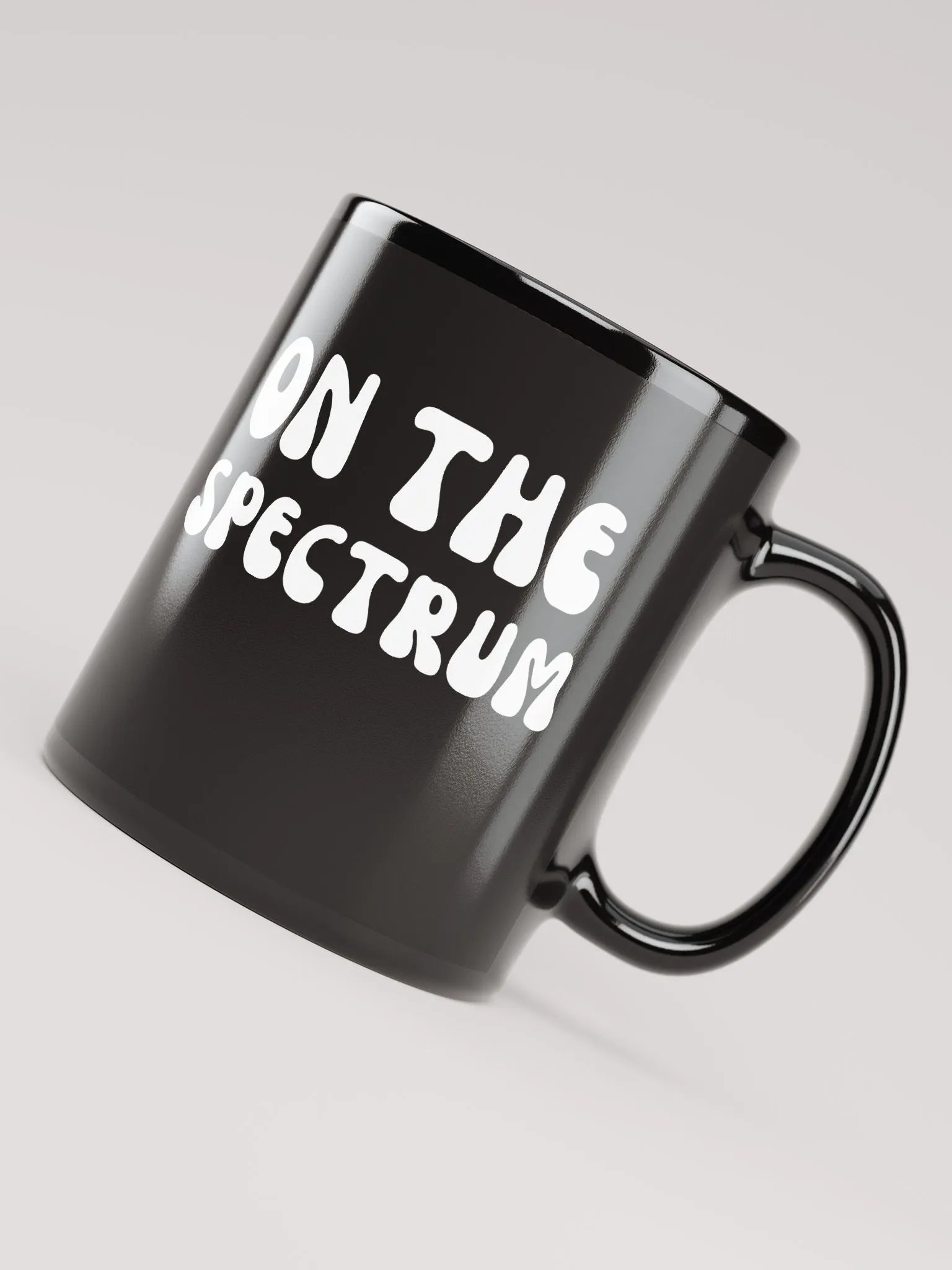 ON THE SPECTRUM (groovy white) glossy black mug product image (7)