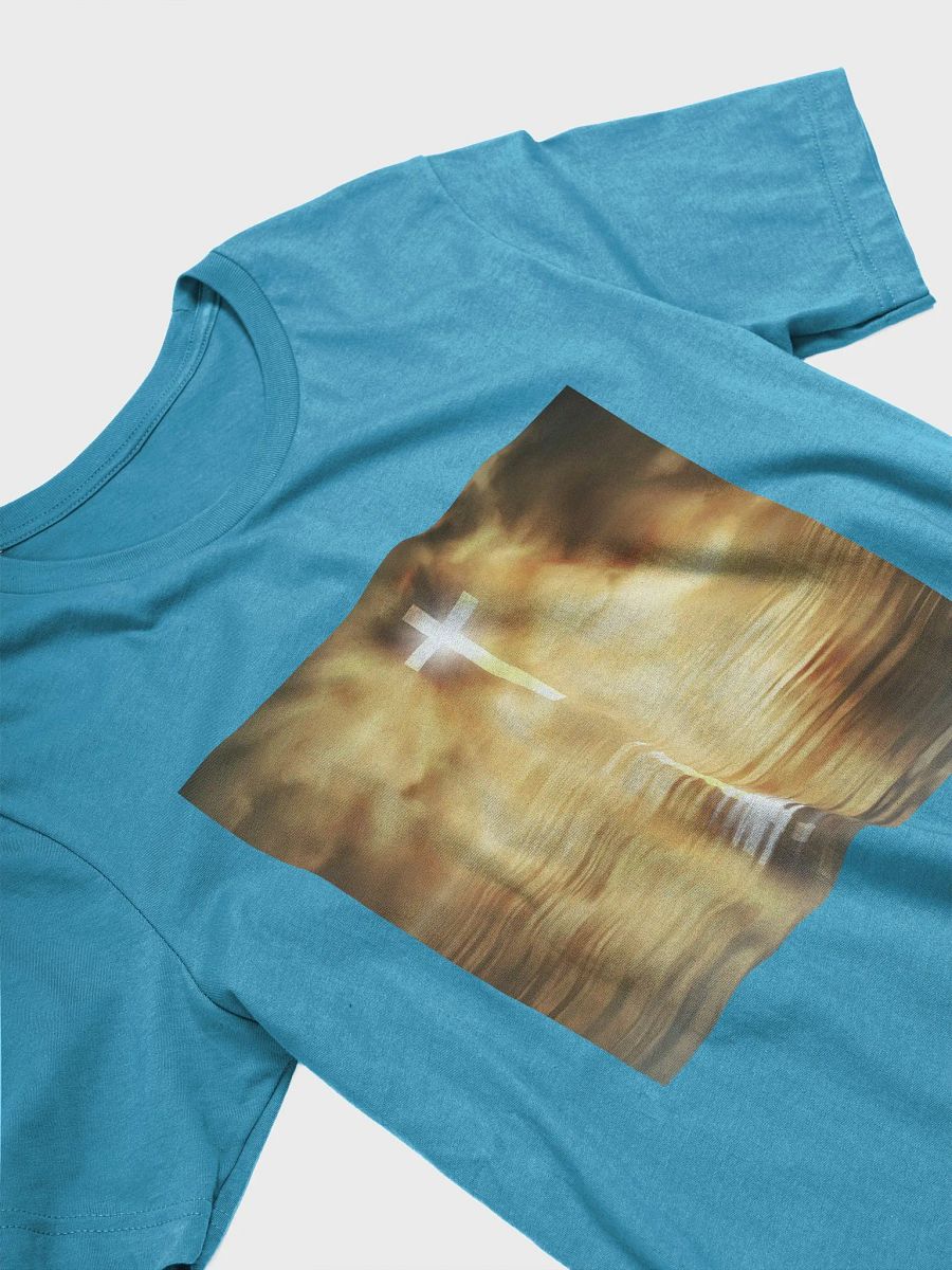 Glowing cross illuminated by intense golden light, reflecting on calm water below t-shirt product image (9)