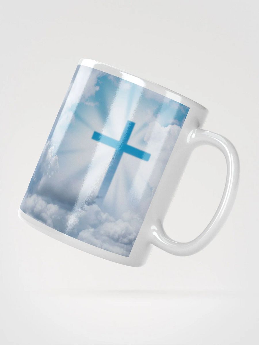 Glowing cross illuminated by intense golden light & a cross surrounded by a heavenly scene, with rays of light shining through soft clouds in a bright blue sky Mug product image (6)