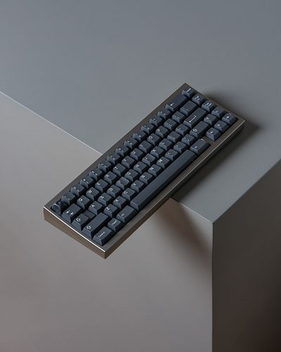The Orbit r2 with a copper bottom.

Built with milky yellows and topped with GMK Boneyard.