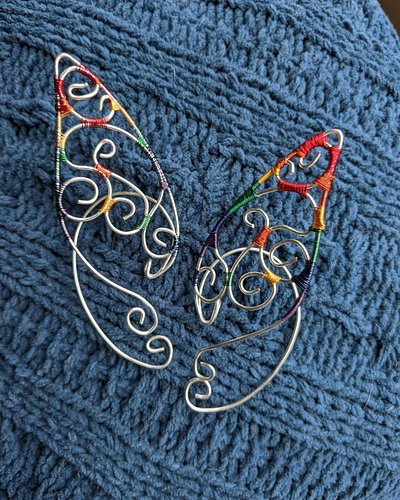 A few more designs that are available now.

https://nike-shop.fourthwall.com/collections/wire-elf-ears