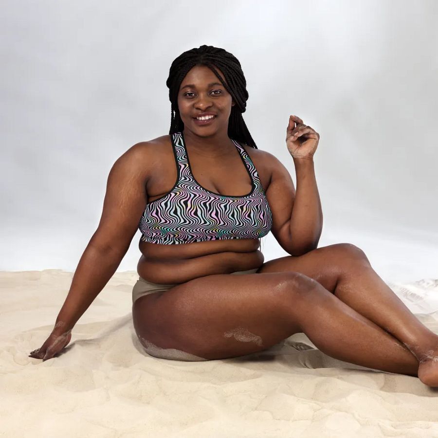 Padded sports bra in wavy pink black and turquoise design product image (12)