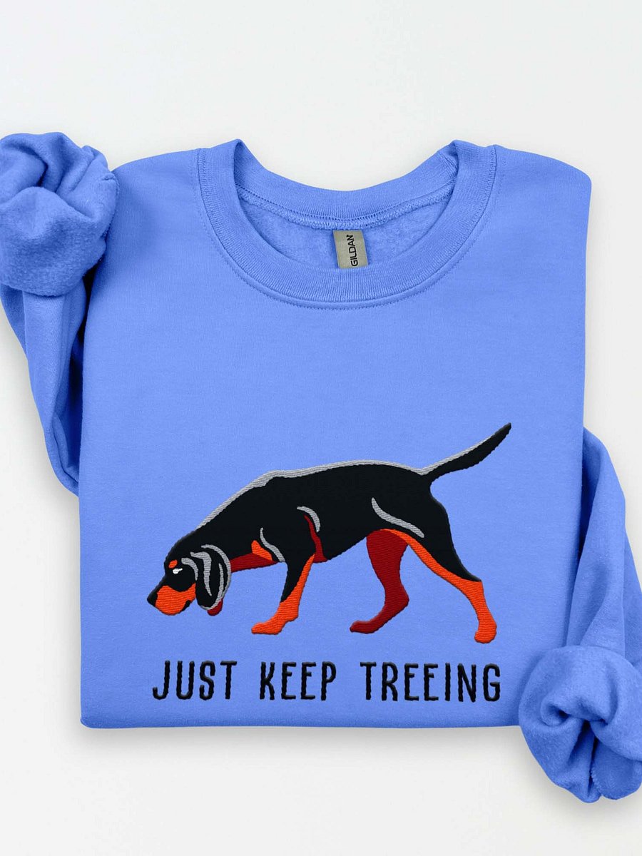 Just Keep Treeing Sweatshirt (Embroidered) of a Black & Tan Coonhound product image (1)