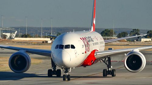 Qantas 100 Year Anniversary Livery (VH-ZNJ) Arriving to Gate 19 At Perth Airport