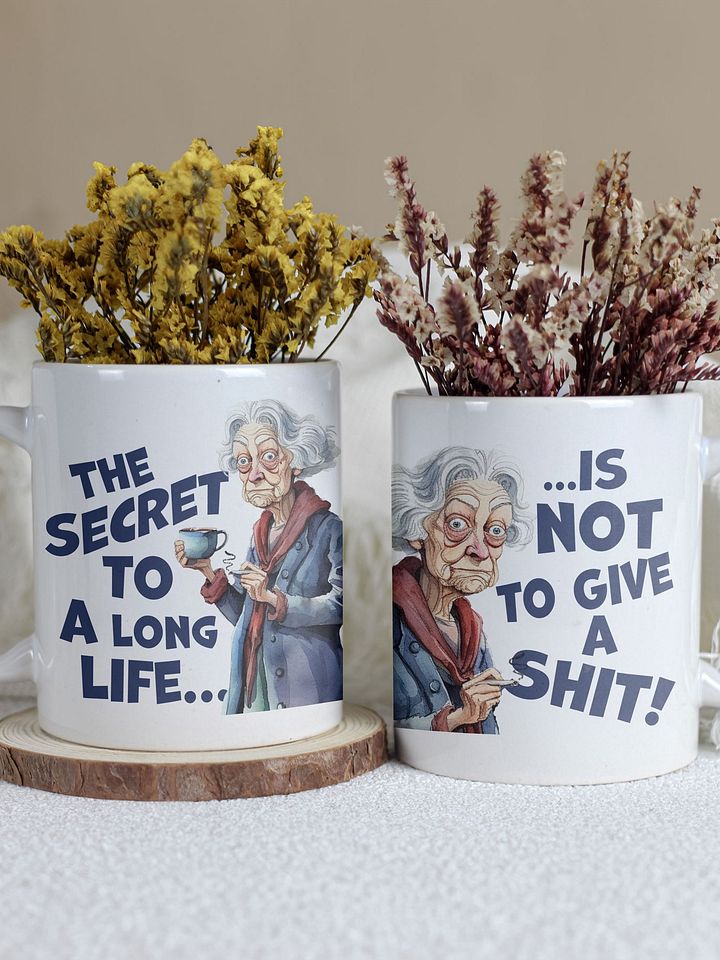 "The secret to a long life... is not to give a shit!" White glossy mug product image (1)