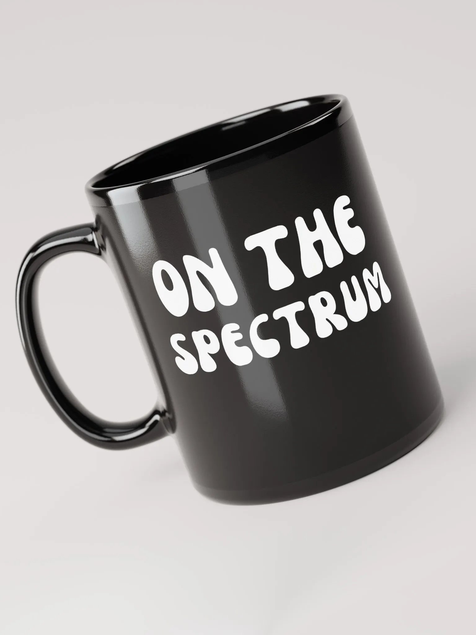 ON THE SPECTRUM (groovy white) glossy black mug product image (5)