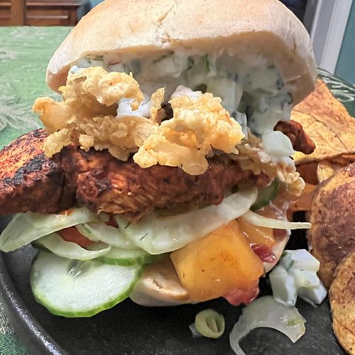 Tandoori Chicken Sandwich on Naan Bread Rolls, with Homemade Mango Chutney, Mint Riata, Deconstructed Onion Bhajis, and Fenne...