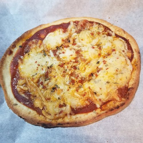 Was going through my pictures, realized I never shared this homemade pizza on naan. It was really delicious and now I'm hungr...