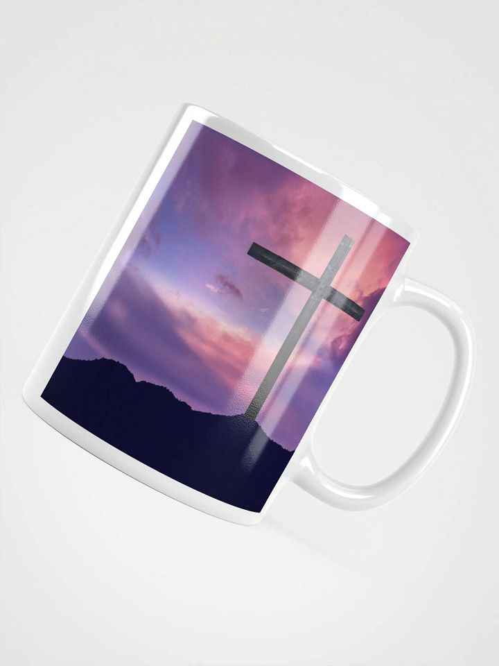 Wooden cross standing on a hill, silhouetted against a vibrant & colorful sky & a cross with a vivid, dramatic background Mug product image (2)
