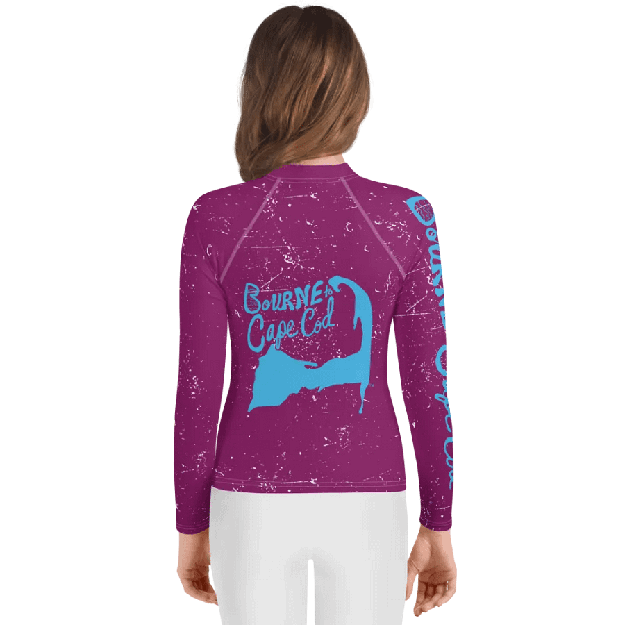 Girls' | YOUTH | Rash Guard | BRN.2C.C.™ Front Graphic | BOURNE to Cape Cod™ Sleeve & Back Logo | Coastal Swim Shirt for Kids | UV Protection Activewear | Blue Logo on Distressed Purple product image (2)