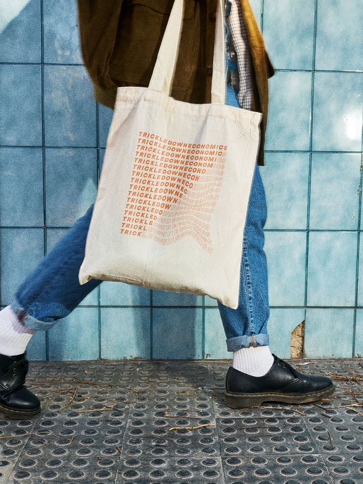 Trick Economics Tote (orange text) product image (1)