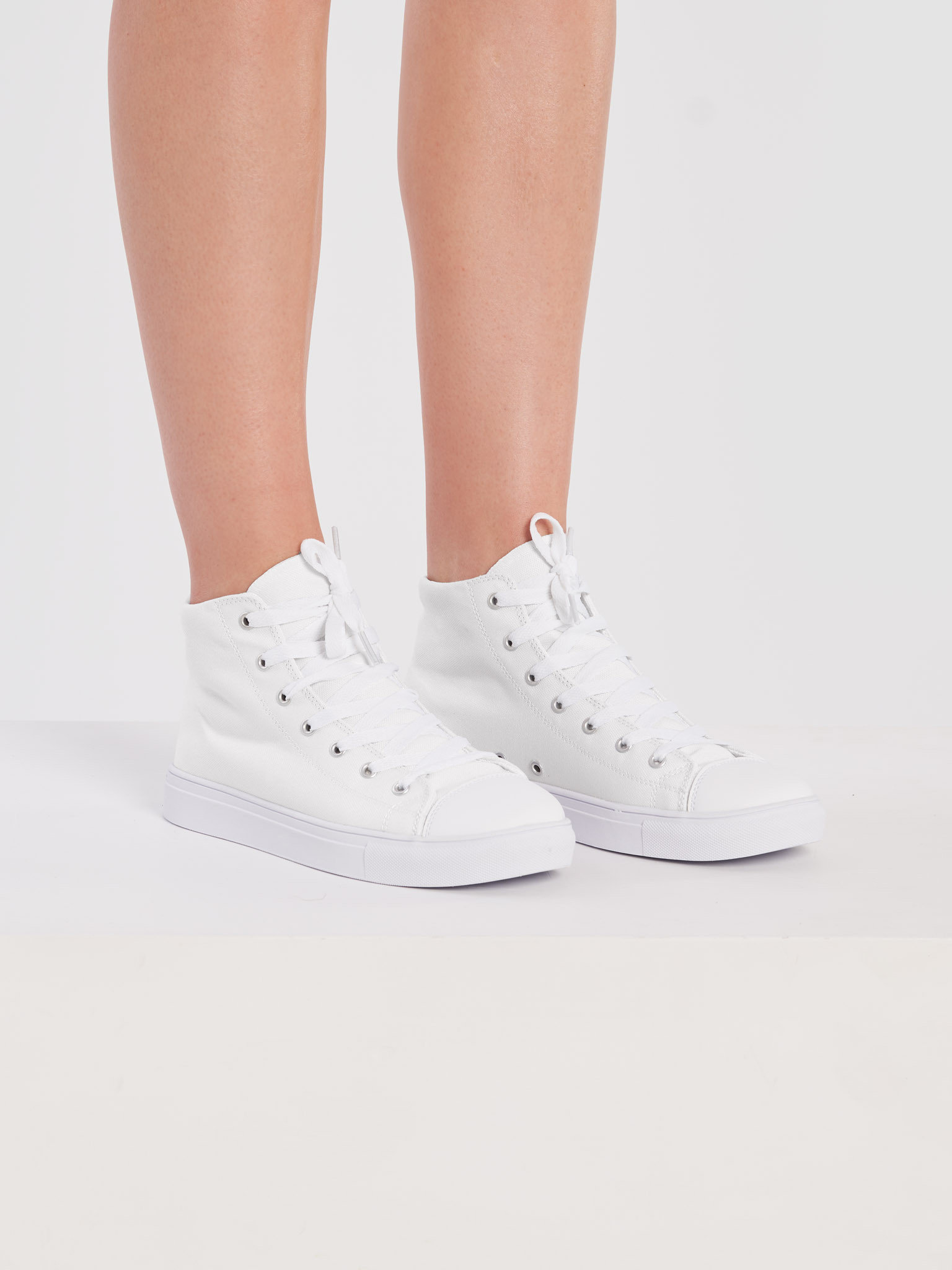 Photo showing Women's High Top Canvas Shoes