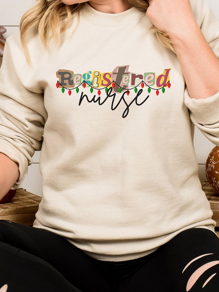 Registered Nurse Christmas Retro Sweatshirt with Christmas Lights - Light Colors product image (1)
